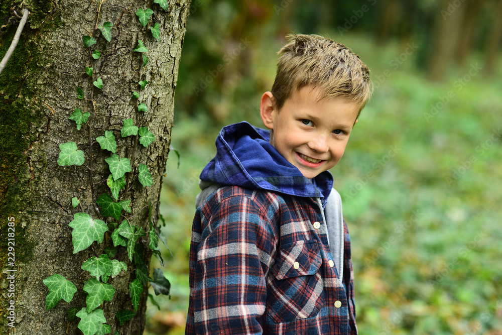 Small boy enjoy childrens day. Small boy play on autumn day. Protecting childrens rights. Every child matters Small boy enjoy childrens day. Small boy play on autumn day. Protecting childrens rights. Every child matters