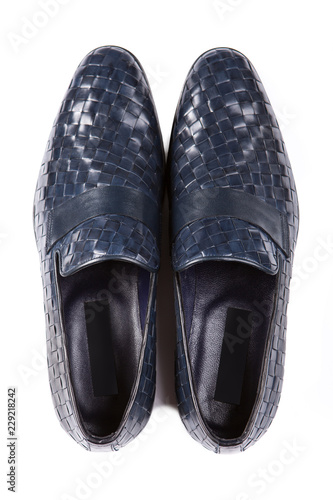 blue men's shoes made of woven leather, top view, on a white background, a pair of shoes, isolate