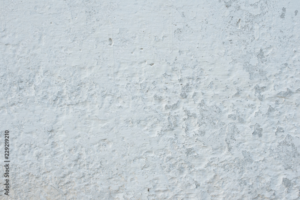 Wall fragment with scratches and cracks. It can be used as a background Wall fragment with scratches and cracks. It can be used as a background