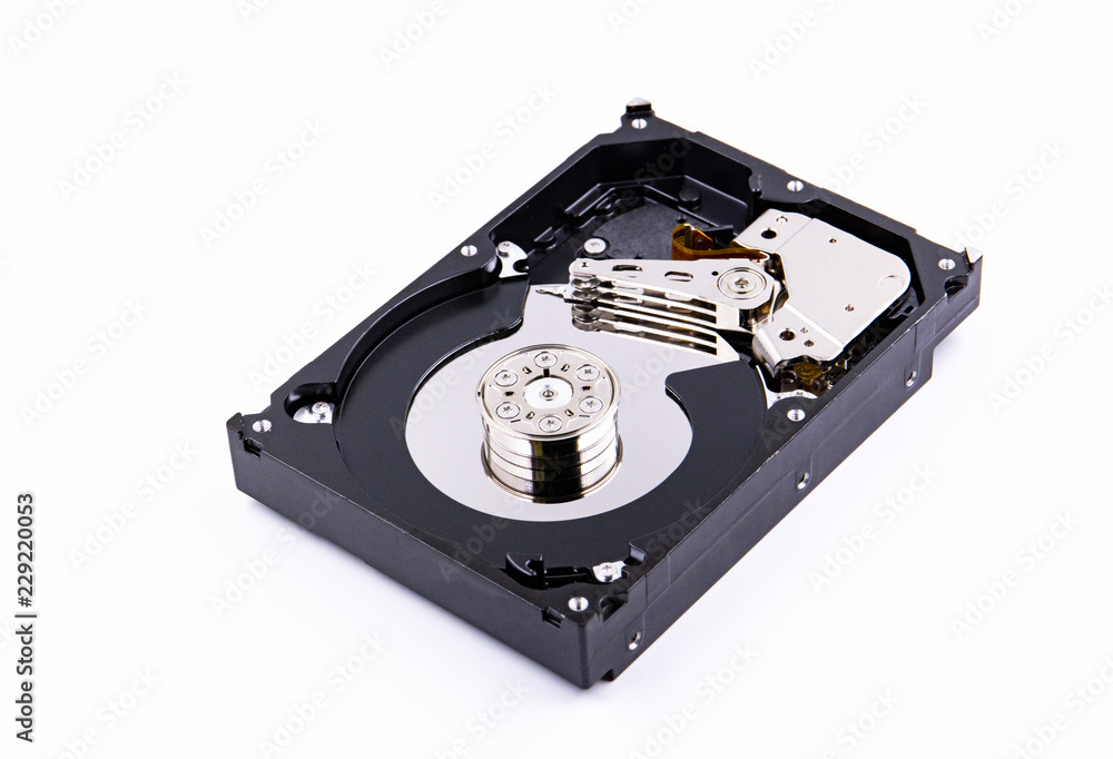 hard drive with the lid open on a white background hard drive with the lid open on a white background