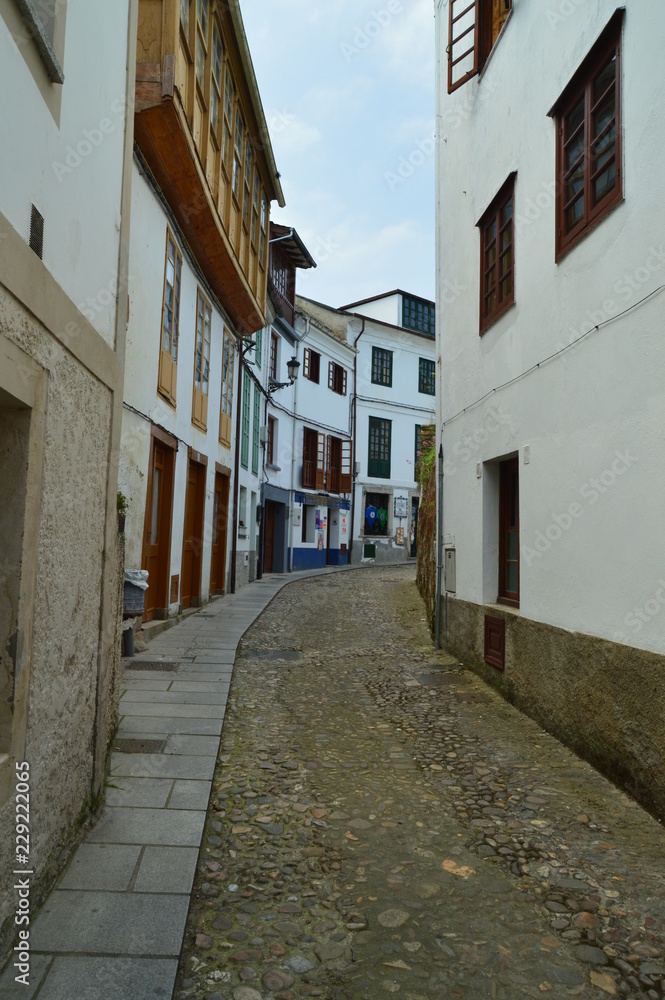 Picturesque, narrow, curves and uphill streets in Castropol. August 2, 2018. Architecture, Nature, Travel. Castropol, Asturias, Spain.