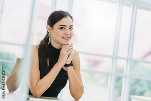smart attractive businesswoman office background