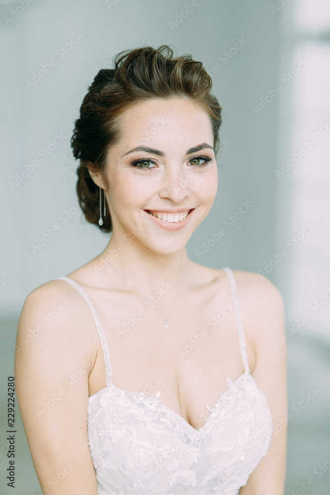 Beautiful bride in a white Studio. Russian wedding in St. Petersburg. Portrait and details in fine art style. Beautiful bride in a white Studio. Russian wedding in St. Petersburg. Portrait and details in fine art style.