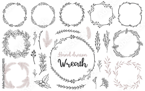Set of hand drawn wreath and branches. Decorative elements for your design. Vector illustration