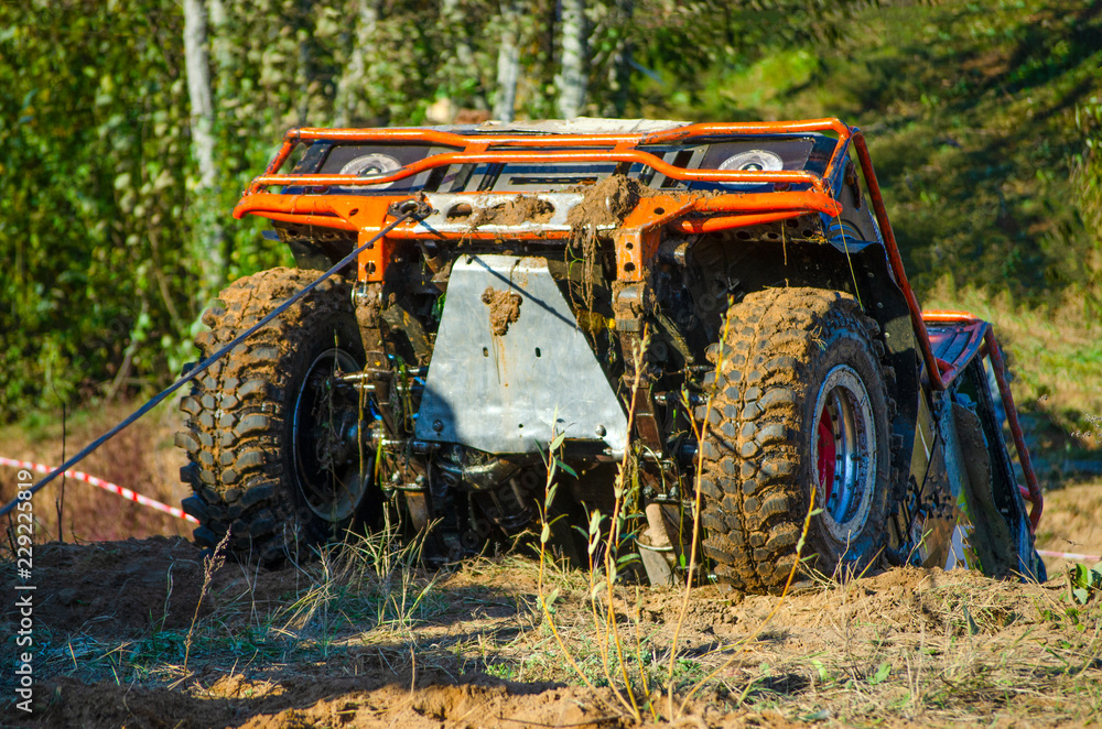 Obraz premium Off-road vehicles on water and mud