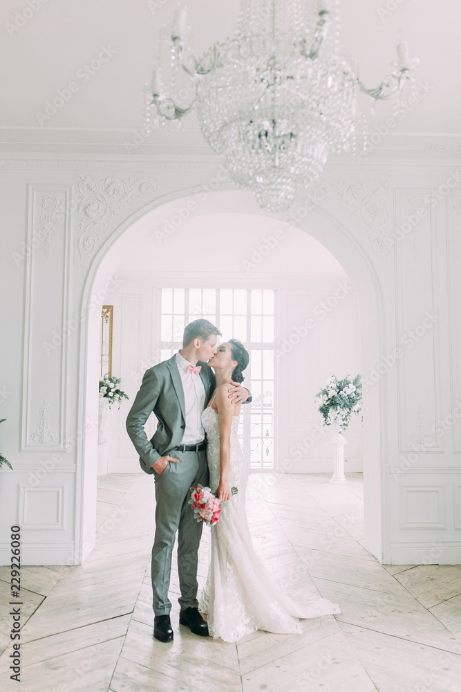 Fototapeta premium Stylish wedding in St. Petersburg. Russian wedding in European style in the Studio. Fine art in photography.