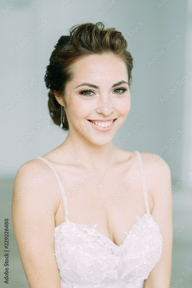 Beautiful bride in a white Studio. Russian wedding in St. Petersburg. Portrait and details in fine art style. Beautiful bride in a white Studio. Russian wedding in St. Petersburg. Portrait and details in fine art style.