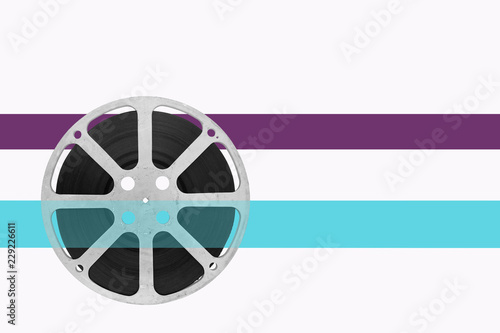 film reel on white background with color tape