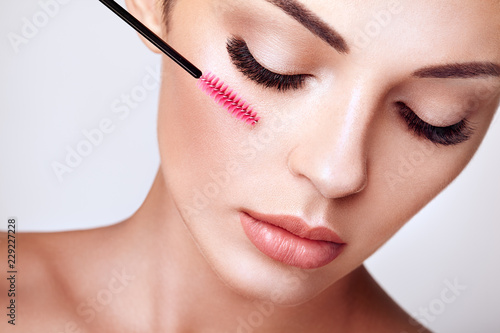 Bild auf Leinwand Beautiful Woman with Extreme Long False Eyelashes