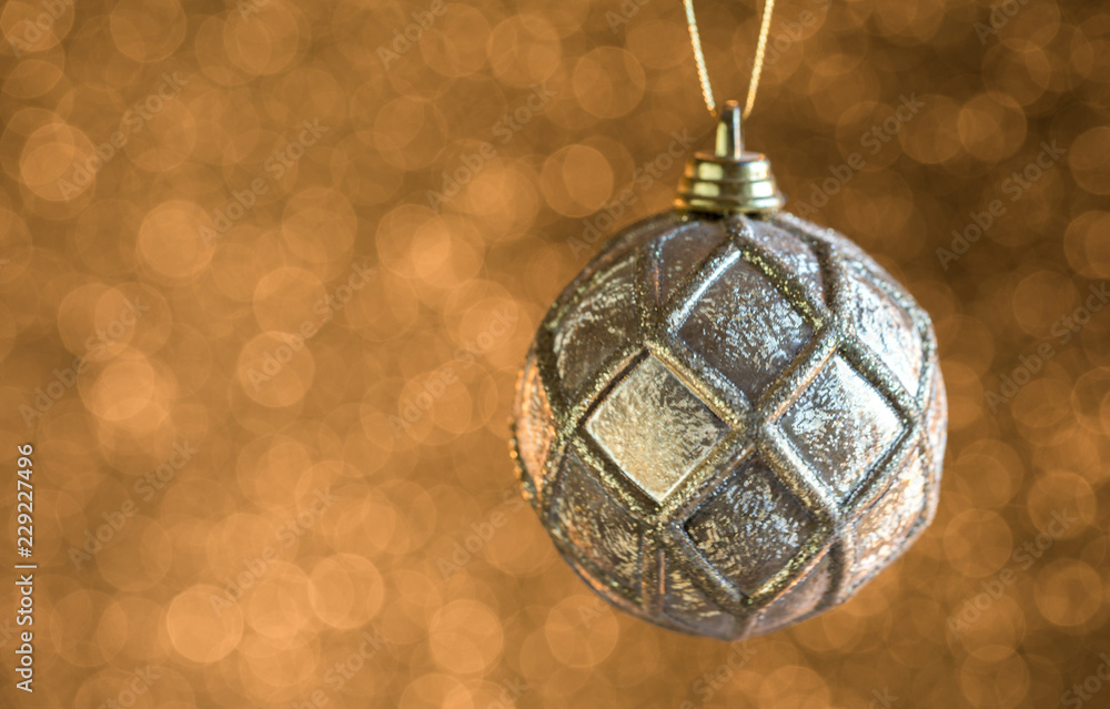 Defocused Abstract Blurred Shiny Christmas Background with Sparkles Golden Ball Decoration Happy New Year Festive Holiday with Light Effect Boke Space for text Selective focus Defocused Abstract Blurred Shiny Christmas Background with Sparkles Golden Ball Decoration Happy New Year Festive Holiday with Light Effect Boke Space for text Selective focus