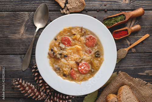 Slovak national food - christmas cabbage soup with mushrooms on natural background.