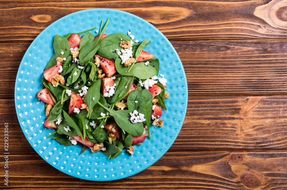 Strawberry salad with spinach , cheese and walnut Strawberry salad with spinach , cheese and walnut