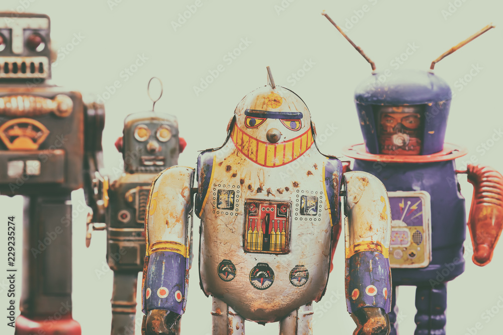 Four vintage rusted colorful tin toy robots - obrazy, fototapety, plakaty 