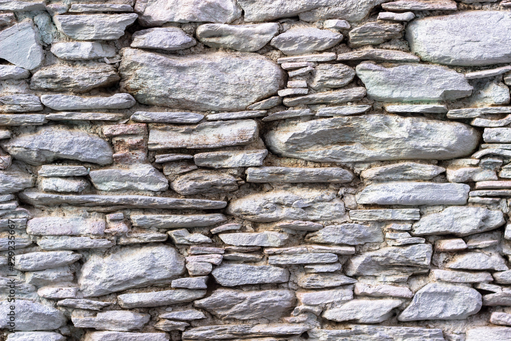 Front shoot of white colored masonry stone wall made by turkish wall craftsman Front shoot of white colored masonry stone wall made by turkish wall craftsman