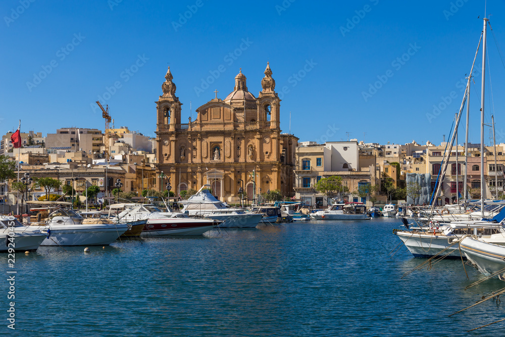 Msida, Malta. Scenic view of the baroque church of St. Joseph on the embankment, 1889