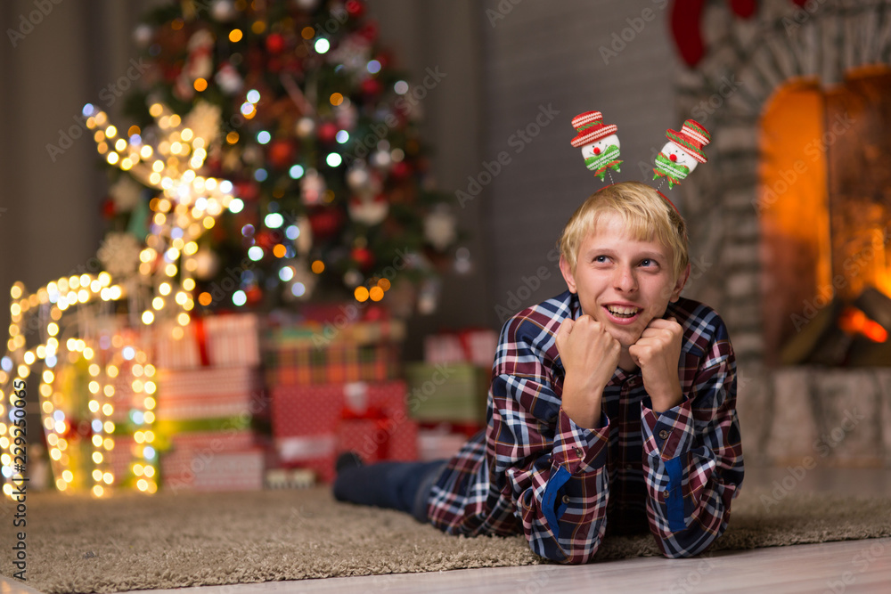 guy near christmas tree guy near christmas tree