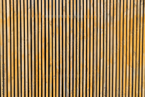 Wall of wooden vertical slats