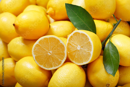 fresh lemons as background, top view