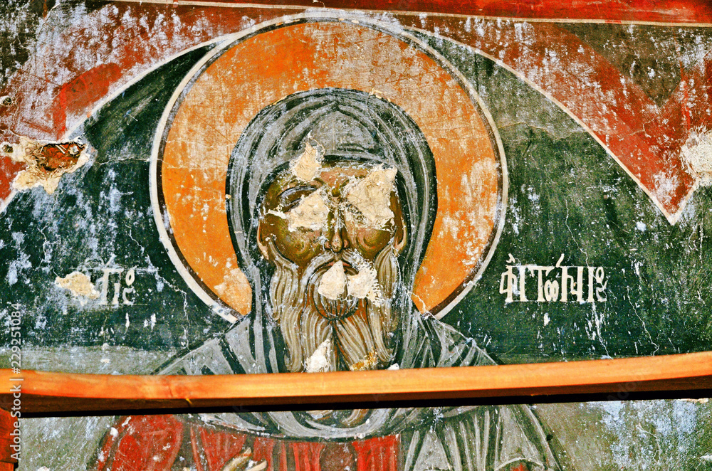 Fototapeta premium Destroyed frescoes from the ancient church of Saint Athanasios (1614) in Tsaritsani, Elassona, Greece