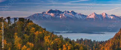 Tatra mountains panorama over autumn forest in the morning, Poland