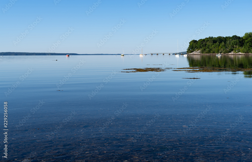 View of Penobscot Bay from the shore at  Searsport, Maine in the early morning light.