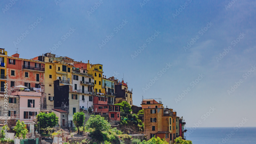 Colorful houses on hills in Corniglia, Cinque Terre, Italy