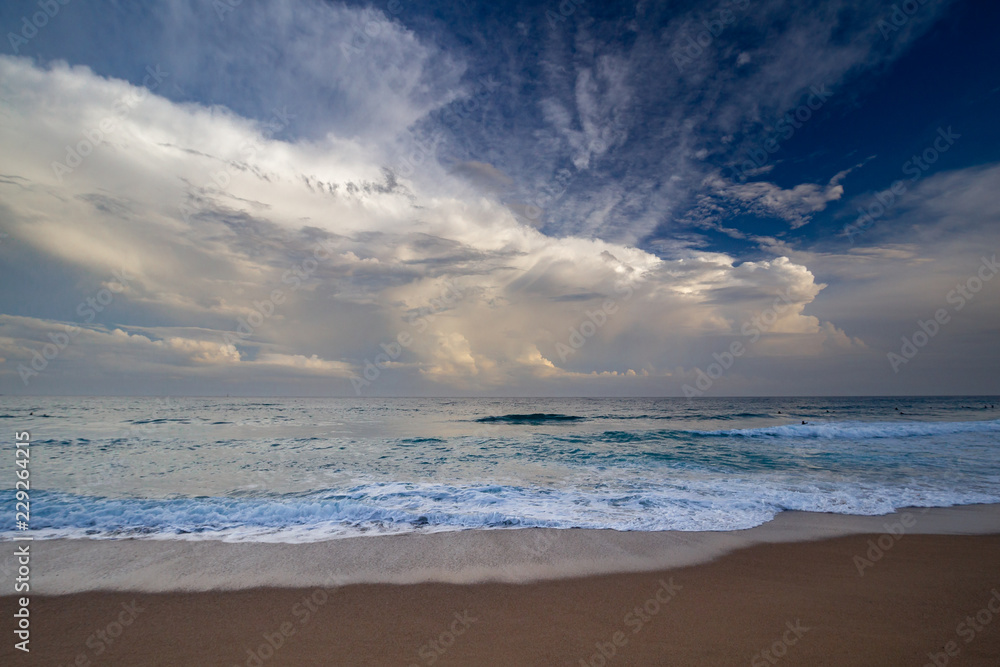 Beautiful blue ocean picture with interesting clouds in a Spanish coastal, in Costa Brava, near the town Palamos