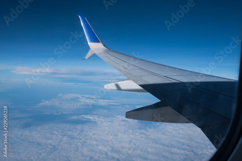 airplane flight blue sky