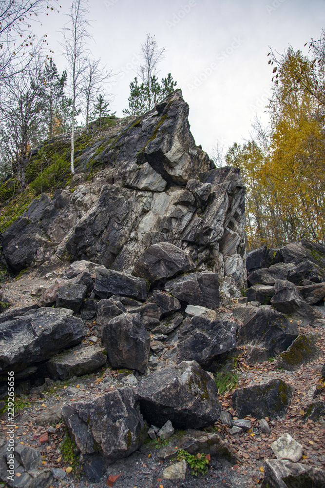 Untreated rough natural gray stone in everyday environment
