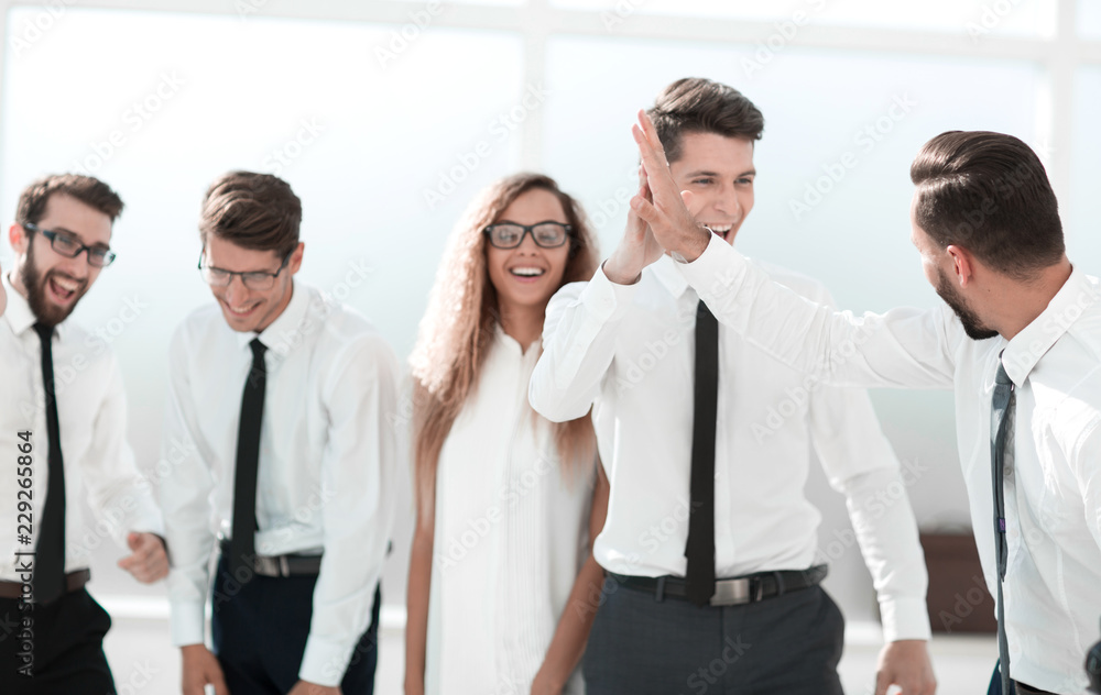 close up.happy business team standing together close up.happy business team standing together