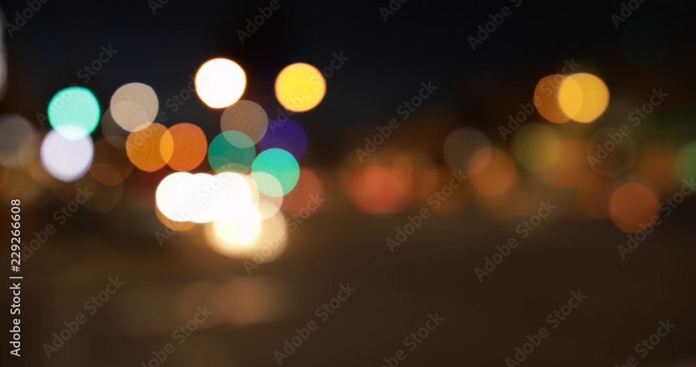 City bokeh from moving cars for green screen