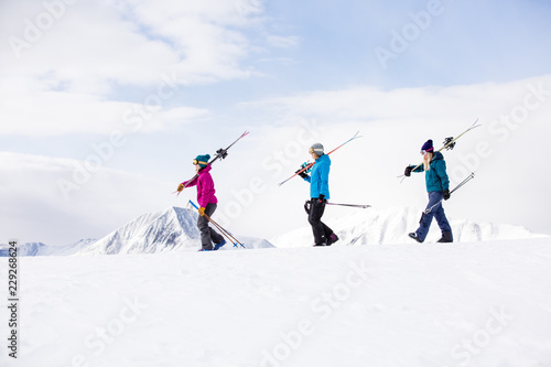 winter, skiing, woman, mountain, outdoors, happy, people, young, group, friends, smiling, white, fun, hat, beautiful, happiness, together, girls, friendship, casual, athletic, sports