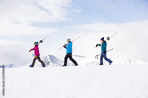 winter, skiing, woman, mountain, outdoors, happy, people, young, group, friends, smiling, white, fun, hat, beautiful, happiness, together, girls, friendship, casual, athletic, sports