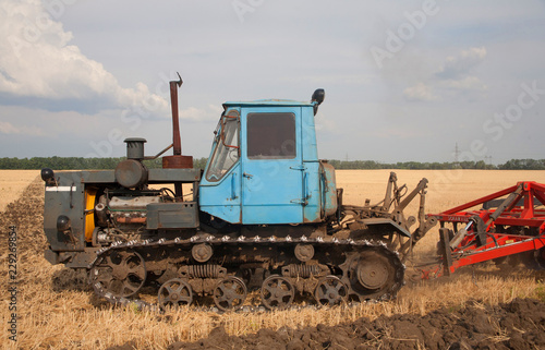 Tractor preparing land for sowing