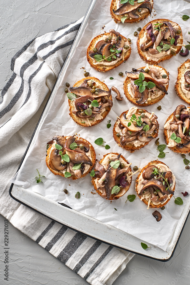 Wholesome Vegan White Bean and Gourmet Mushroom Crostini Toast with Copy Space Wholesome Vegan White Bean and Gourmet Mushroom Crostini Toast with Copy Space