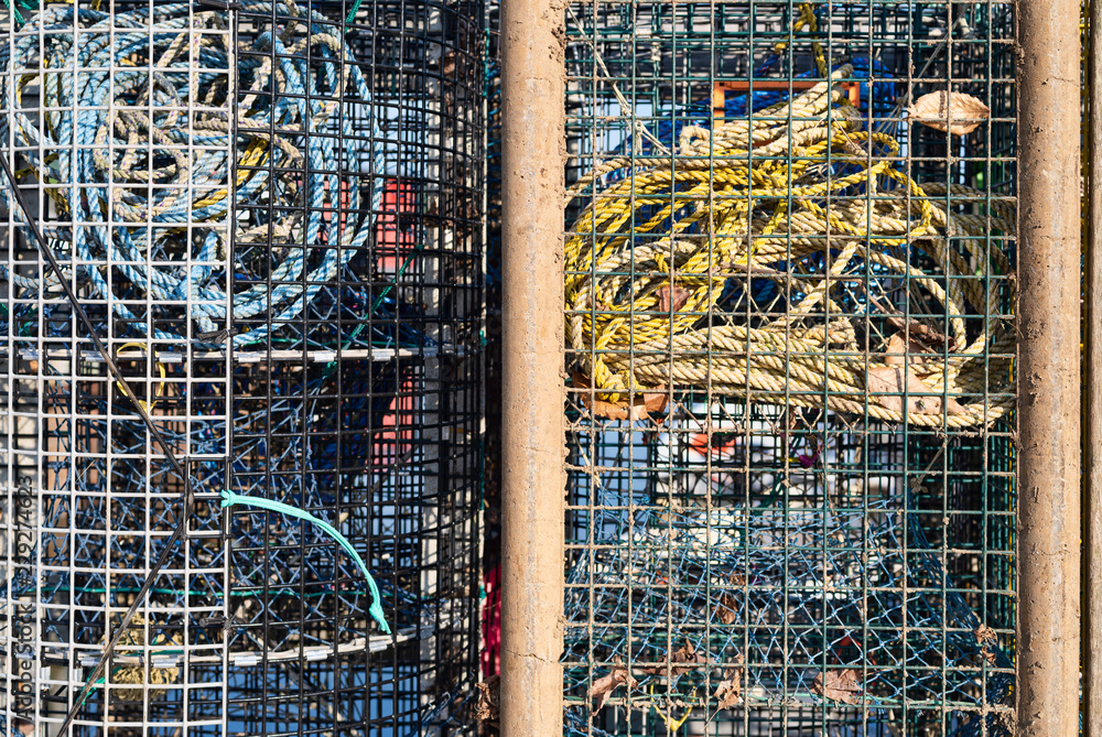 Close view of two lobster traps ready to be used with pot warps inside.