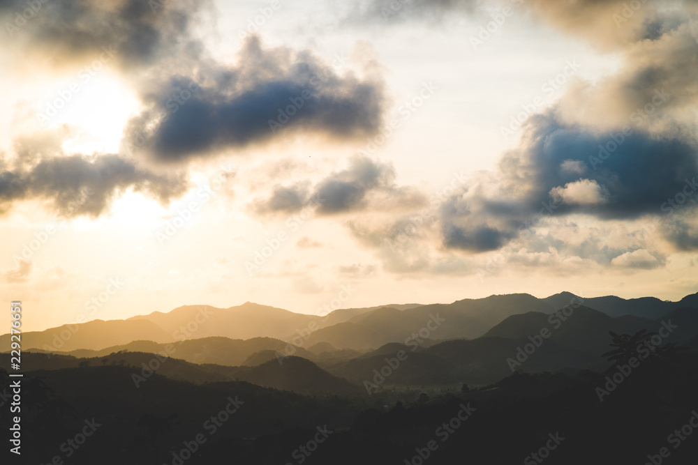 Layered mountains at sunset in Indonesia Layered mountains at sunset in Indonesia