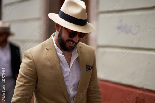 Confident handsome man with hat