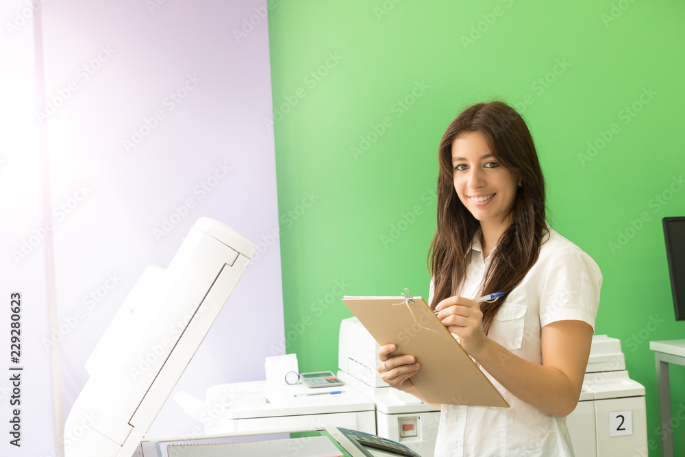 Young student at a copy center