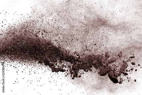 Dry soil explosion on white background. photo