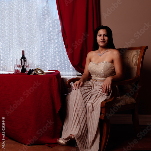 Classy Latin Woman Waiting for a Dinner Date