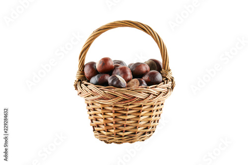 Many chestnuts in crib isolated on white background