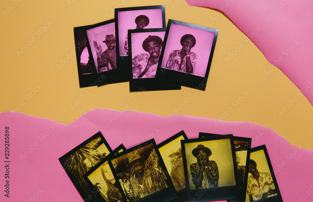 two rows of duochrome polaroid instant prints in yellow and black and pink  and black over ripped yellow and pink paper Stock Photo | Adobe Stock