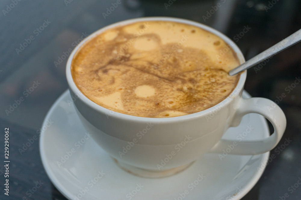 Cup of traditional Vietnamese egg coffee with thick froth Cup of traditional Vietnamese egg coffee with thick froth