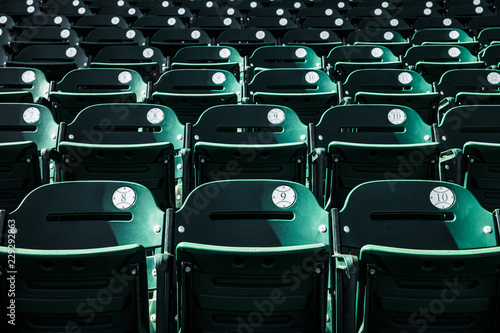 Empty baseball fold up chairs in stadium