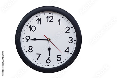 Time concept with black clock at a quarter to six