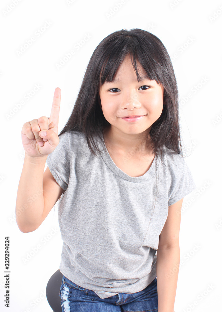 Portrait Of Little Cute Asian Girl With Her Finger Point Up Lovely Small Asian Girl Isolated On