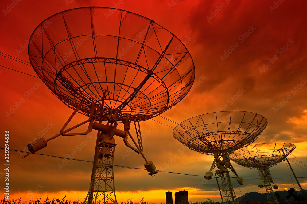 The silhouette of a radio telescope observatory The silhouette of a radio telescope observatory