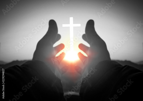 Canvas Print The concept of worship and praise: reaching for the cross