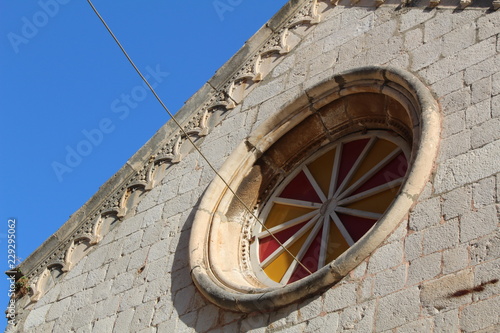 red and yellow round window